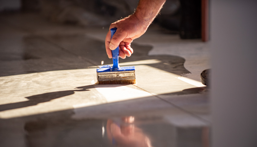 Contractor sealing floor