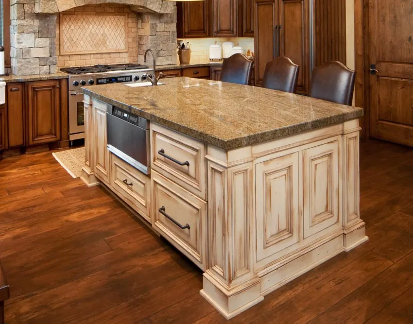 center island kitchen countertop wood floor oven storage drawers cabinets