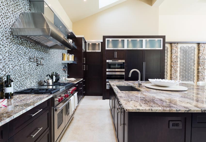 Ceramic flooring, mosaic backsplash and dark wood cabinetry