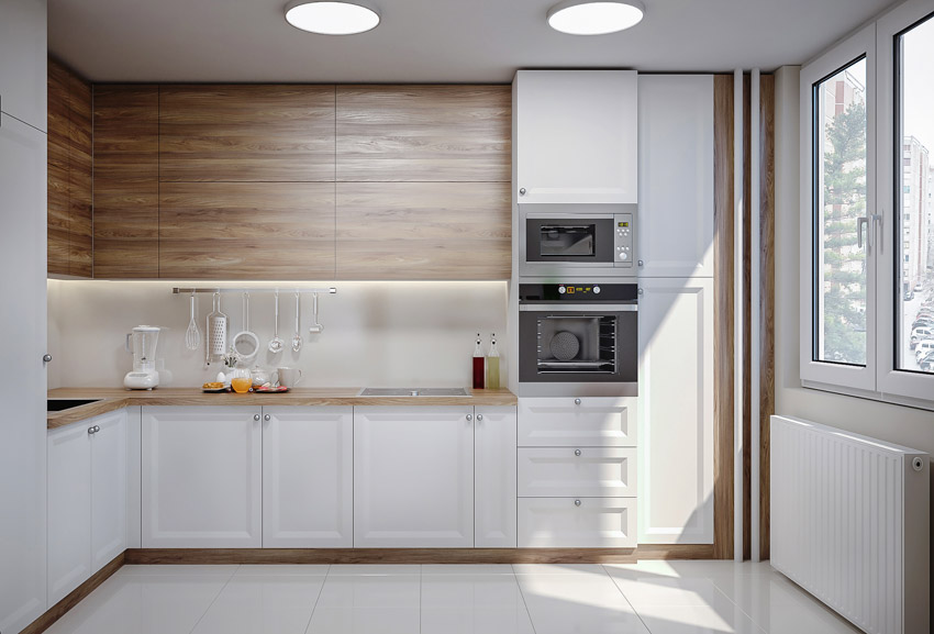 Kitchen low ceiling recessed lighting wood cabinets countertop backsplash windows
