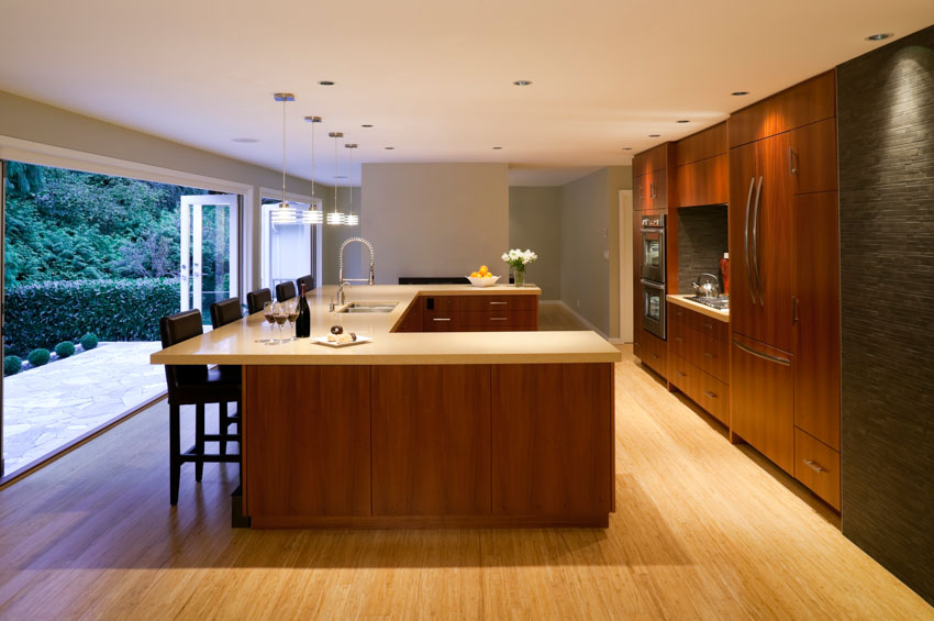 Kitchen with low ceiling lighting fixtures wood floor center island wood cabinets