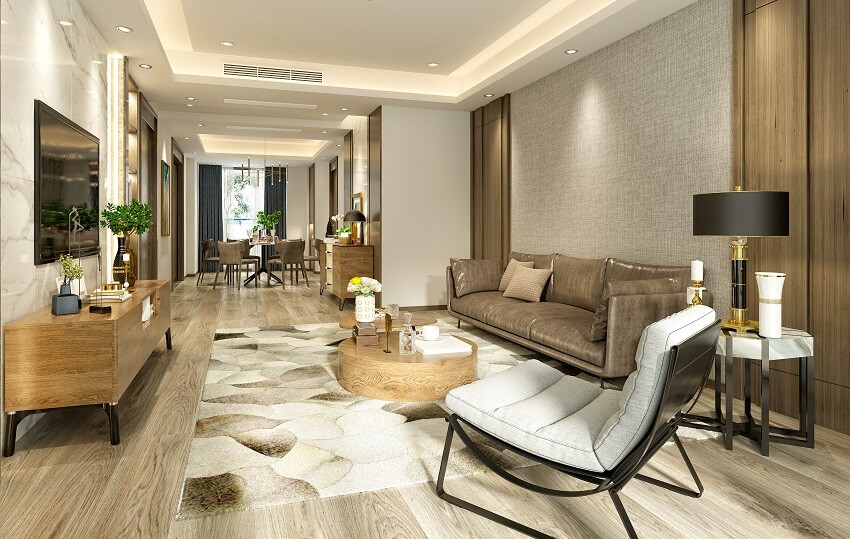 Room with marble wall, console, leather couch and view of the dining layout