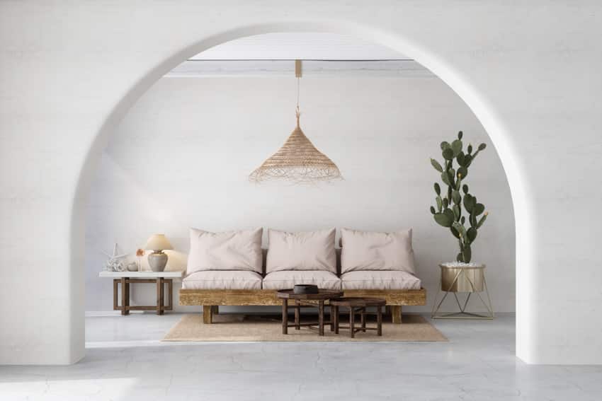 Minimalist living room wood pendant light sofa indoor plant white wall