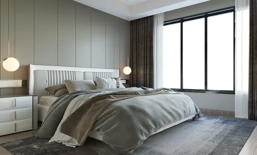 Modern bedroom interior with pendant lights carpet on wood floor a large windows and bed with grey wood panel background