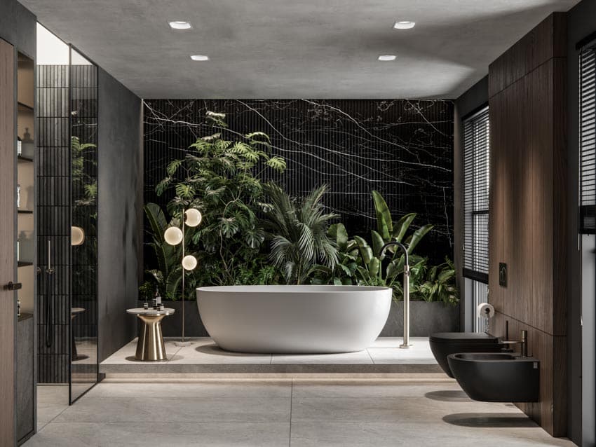 Novelty floor lamp modern bathroom tub concrete floor black sink toilet indoor plants mirror recessed lighting