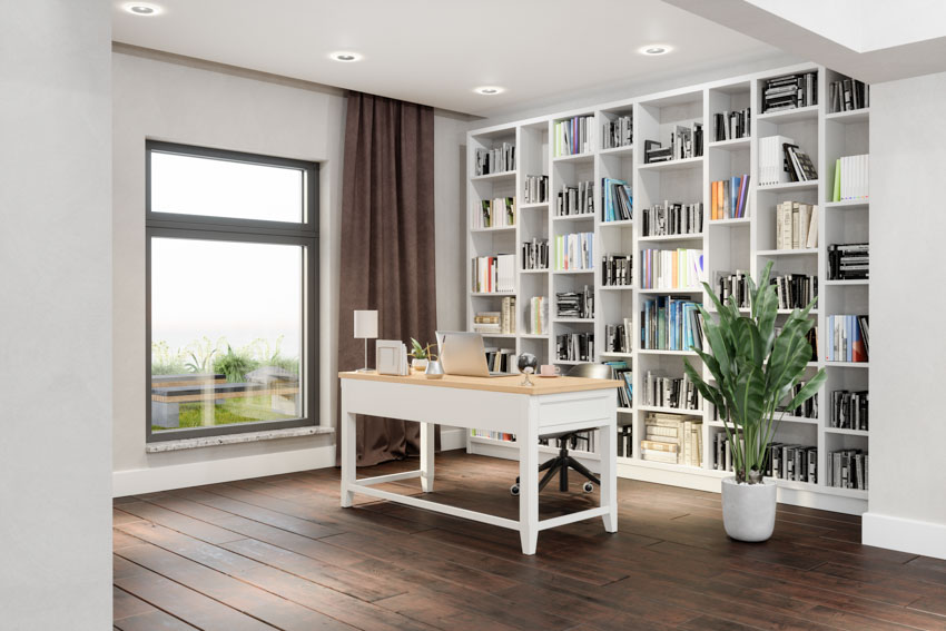 Simple home office window bookshelf wood floor table chair