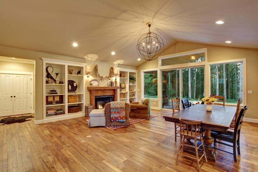 Slight tilted ceiling with globe chandelier