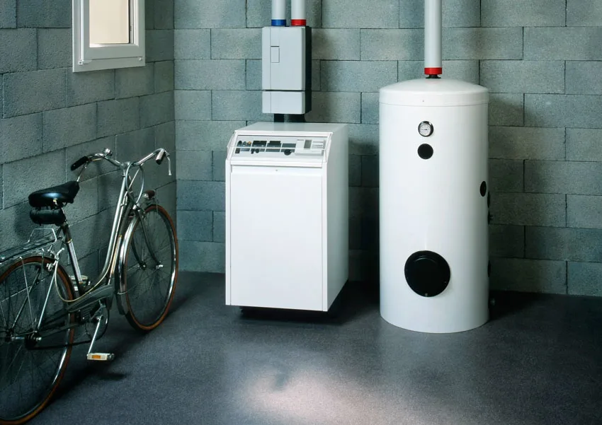 Whole house dehumidifier and boiler in basement bicyle window brick wall
