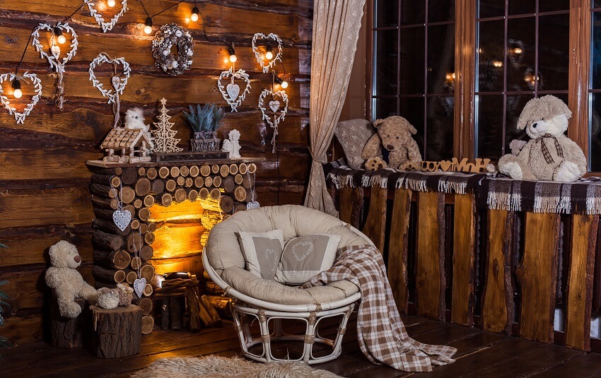 Wooden decorative fireplace, chair and teddy bears 