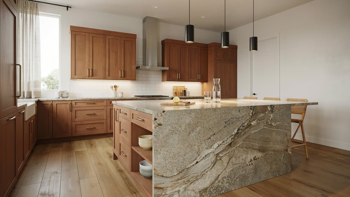 Rocky mountain granite island in brown beige and gray beside walnut cabinets