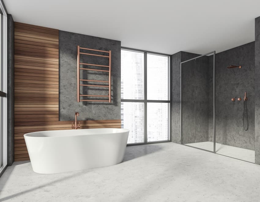 Bathroom with wood accent, wall tub, windows, and shower area