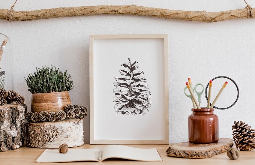 Botany and forest concept of home decor with wooden accessories, succulents and poster frame