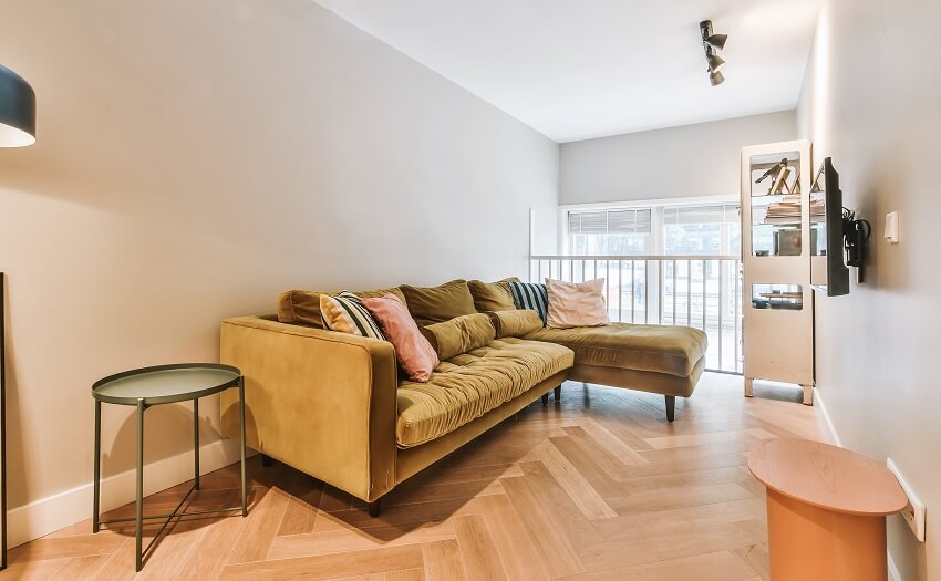 Parquet wood floors with throw pillows