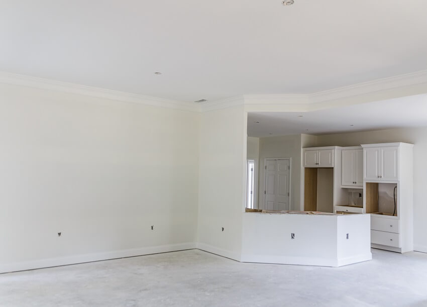 Drywall paint and white cabinets in new home construction