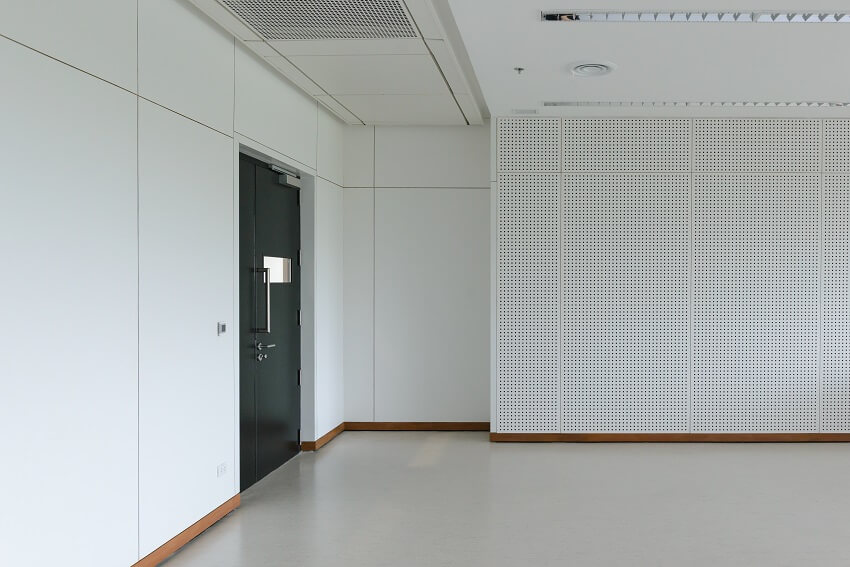 Empty room with concrete floor and soundproof drywall 