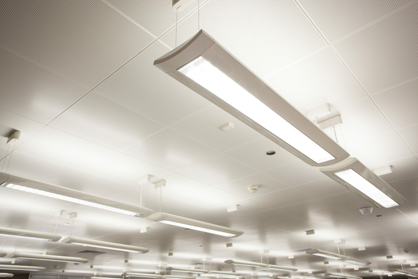 Garage shop lights on white ceiling