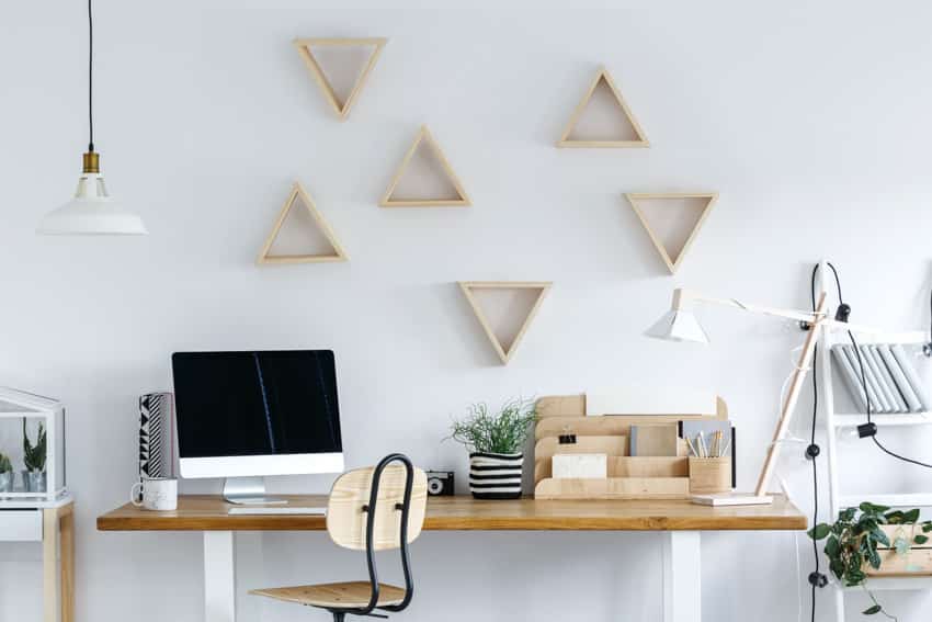 Geometric wood frames as wall decor for home office spaces