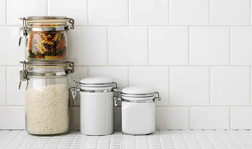 Kitchen with tile countertops and backsplash