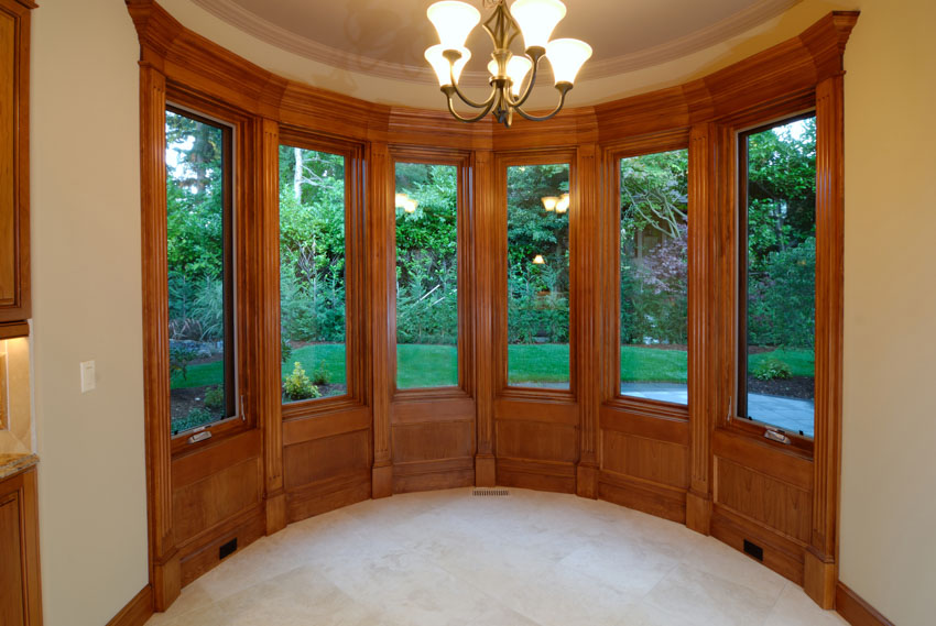 Room with chandelier and panel windows