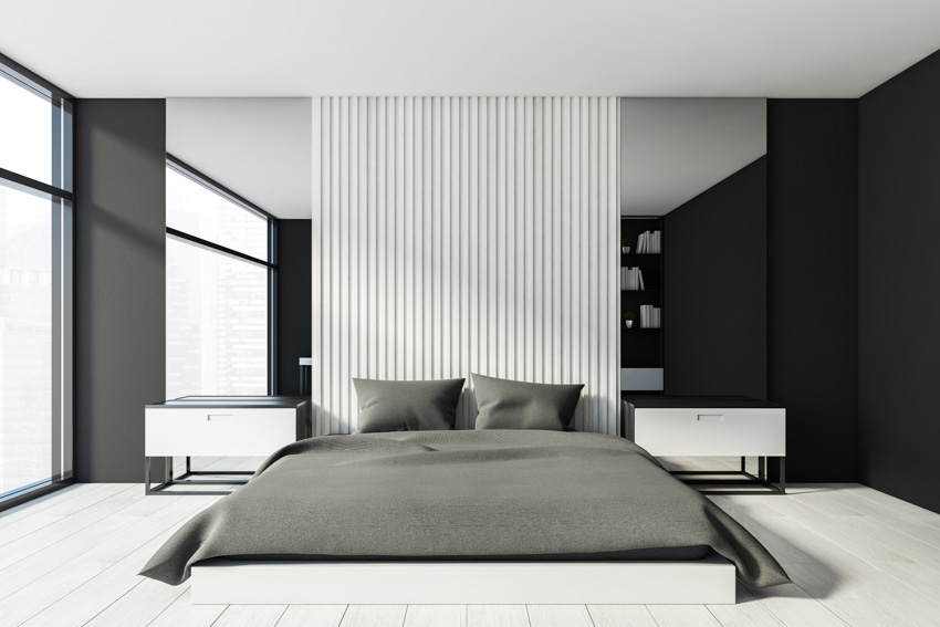 Modern bedroom white wood slat wall, nightstands, and window