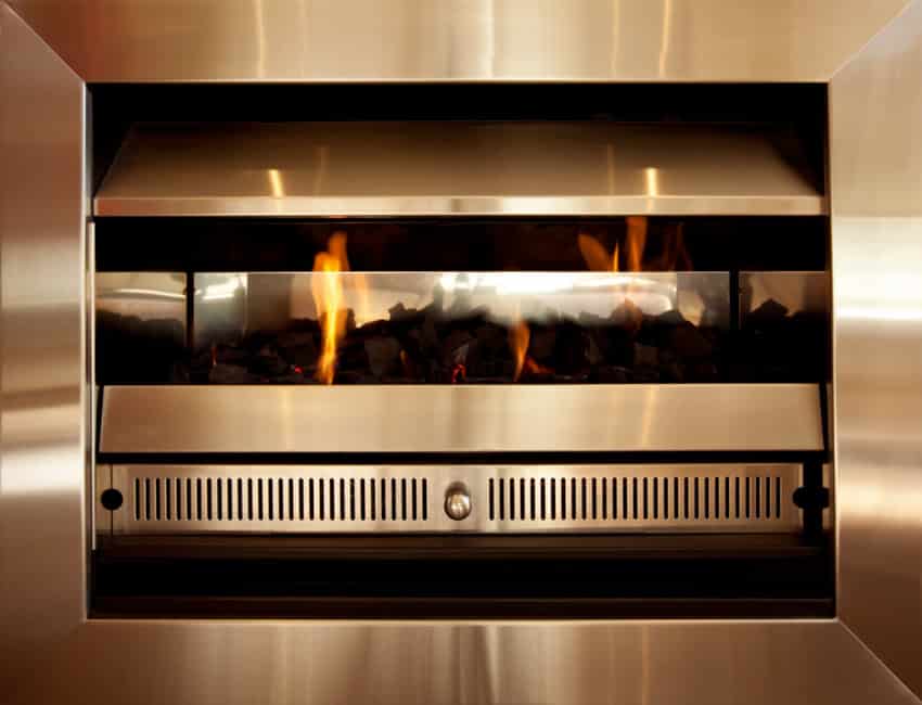 Modern fireplace made of stainless steel with damper