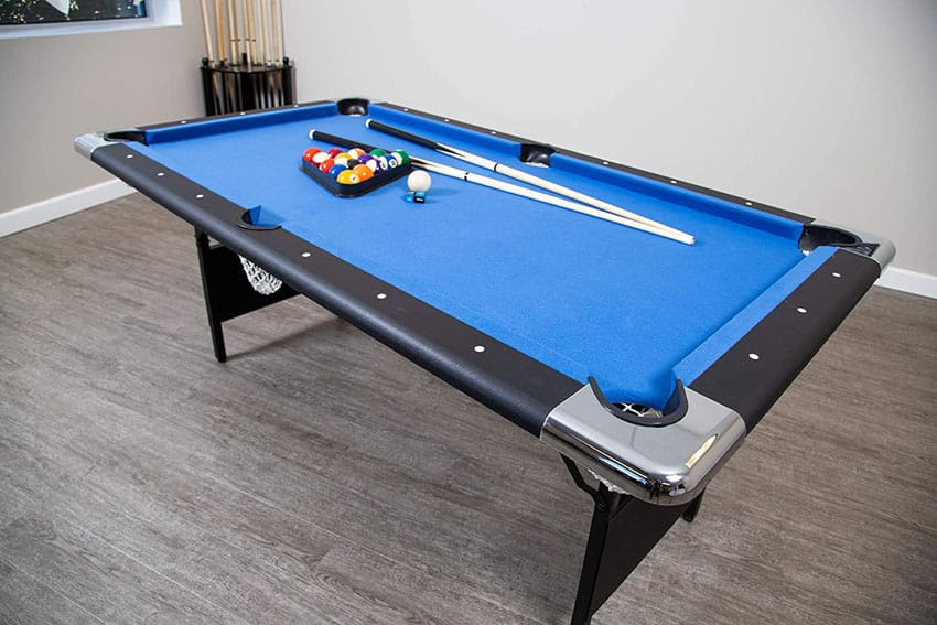 Portable folding pool table with cue sticks and balls