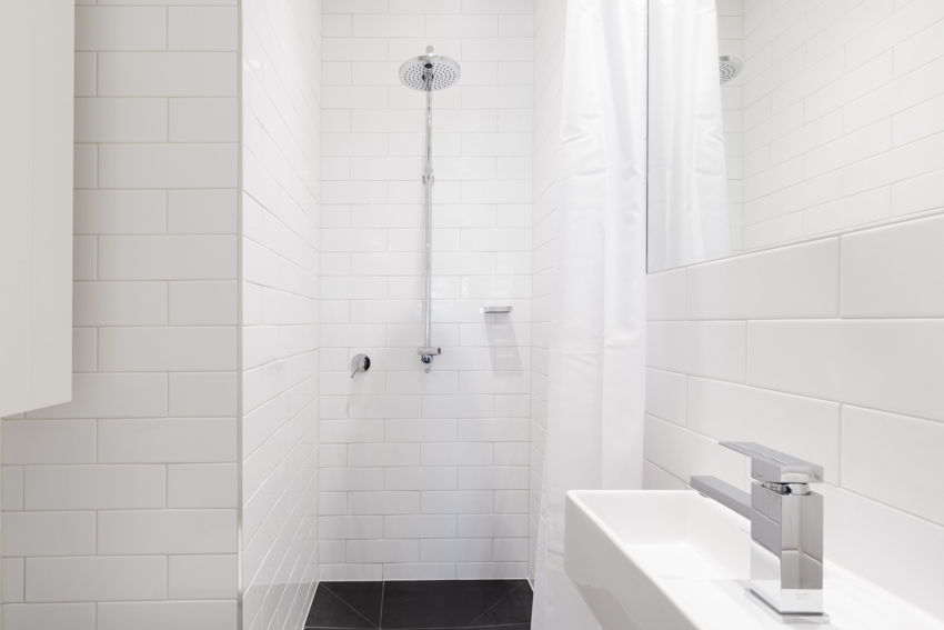 White walled bathroom and shower