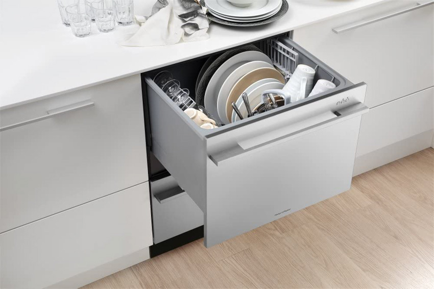 Single drawer dishwasher in a kitchen wood floors