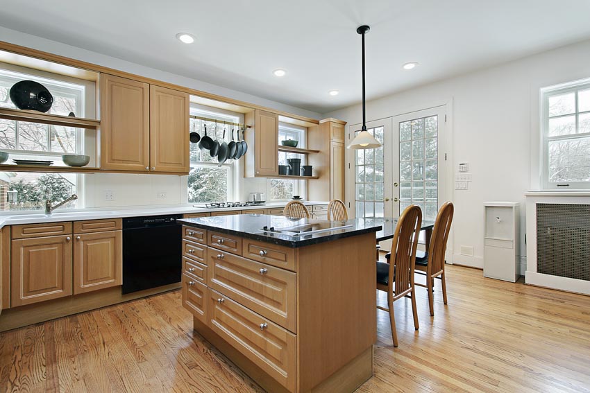 Spacious kitchen with oak wood cabinetry