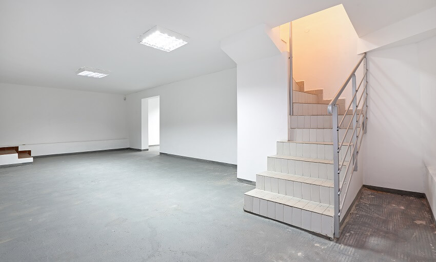 Tiled stairs to empty basement 