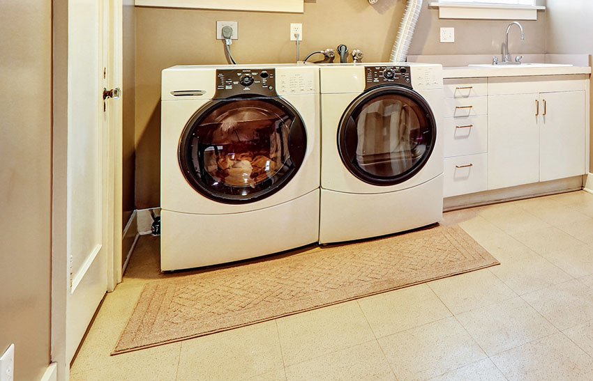 Laundry room with brown paint