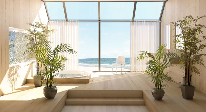 Airbnb rental property with wood floor, glass door, and indoor plants