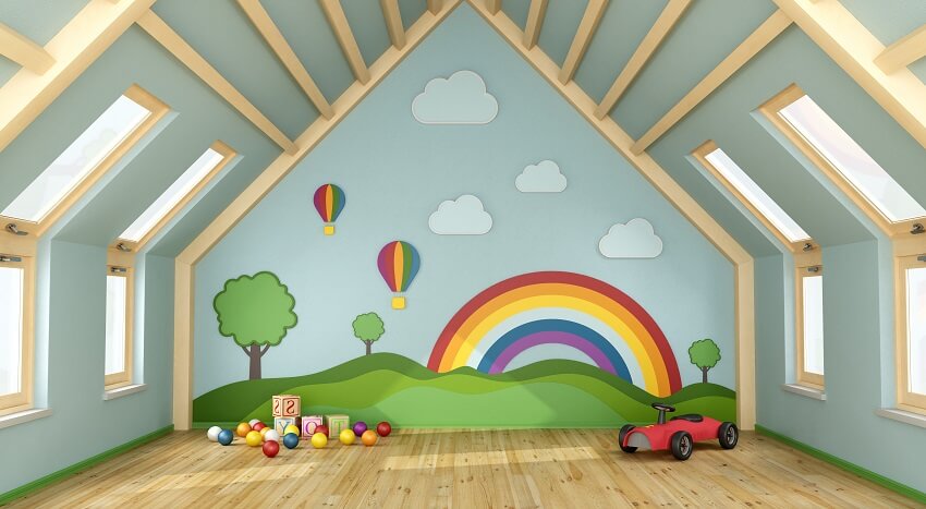 Attic playroom with toys, wall decoration, ceiling beams, and skylight windows