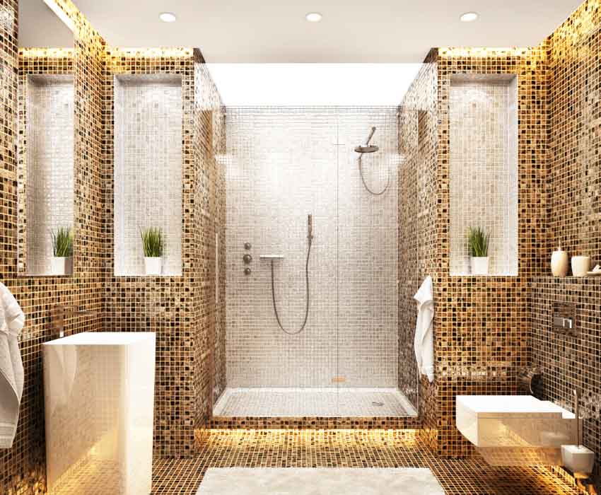 Bathroom with mosaic tile flooring, shower area, mirrors, toilet, and sink