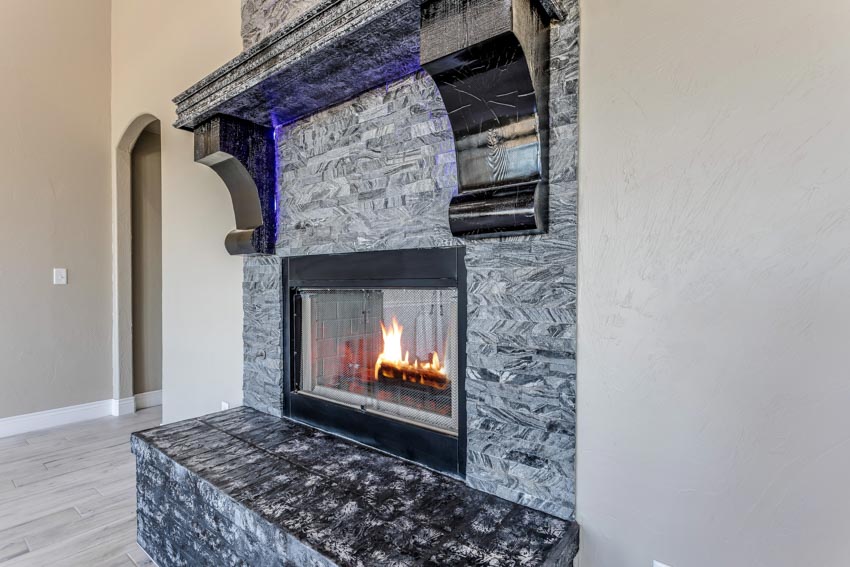 Beautiful fireplace with intricate tile design