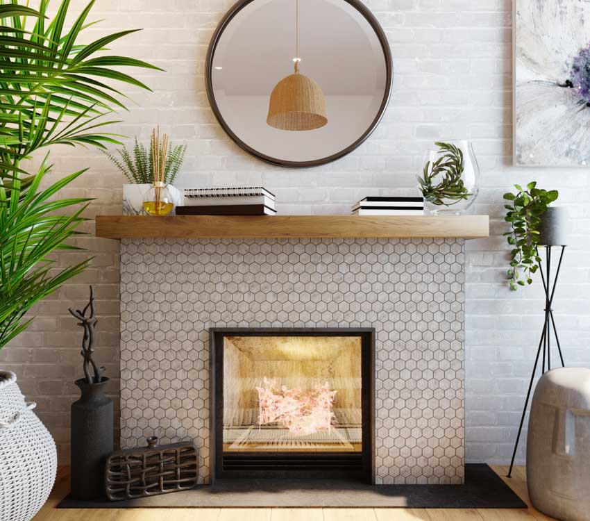 fireplace with mantel and mosaic tile