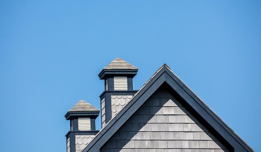 Blue and grey rooftop with cupola of a traditional house