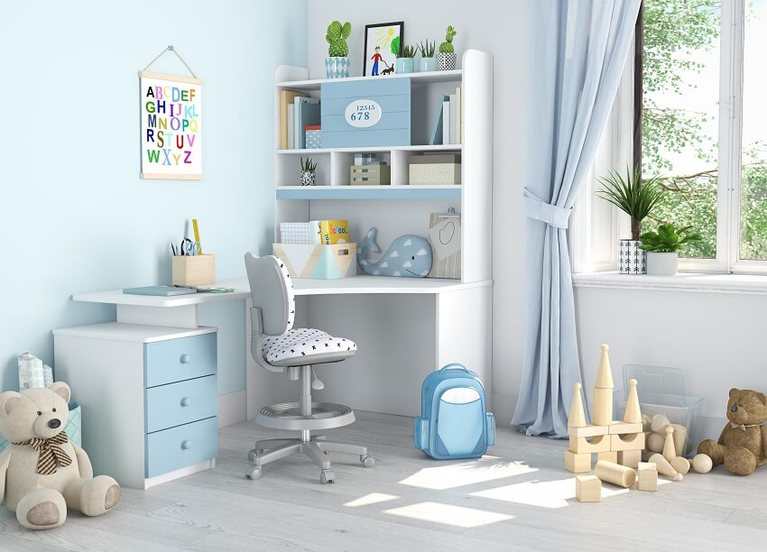 Children's room with study table, light blue and white wall, toys, and vinyl floors