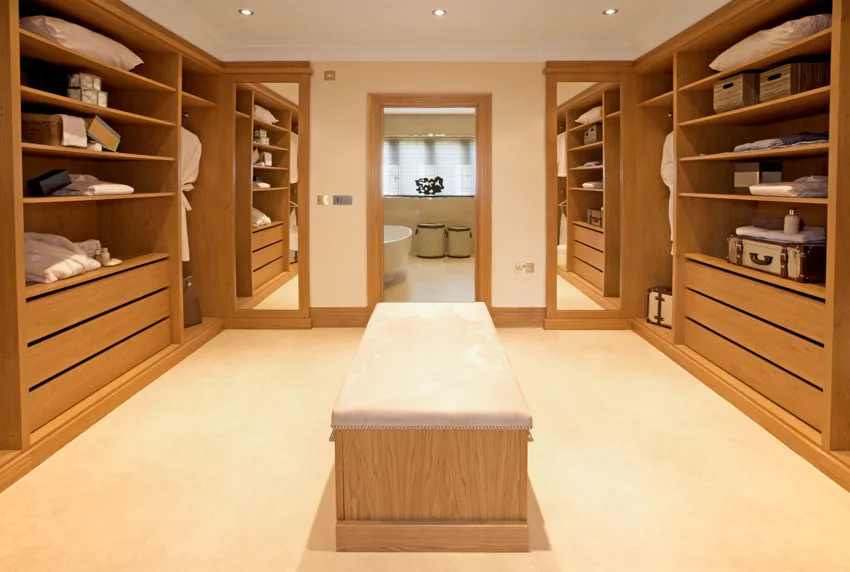 Wardrobe with furnished bench made of wood
