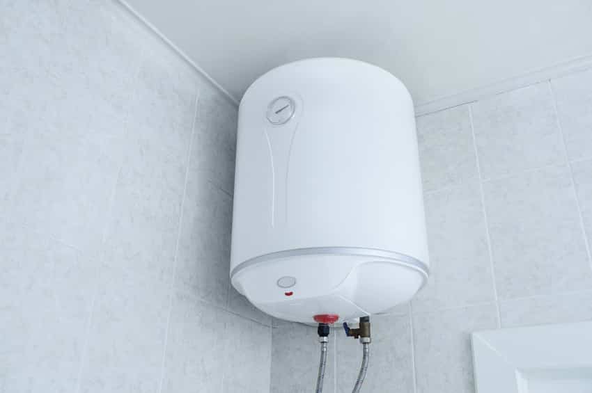 Conventional water heater inside a bathroom