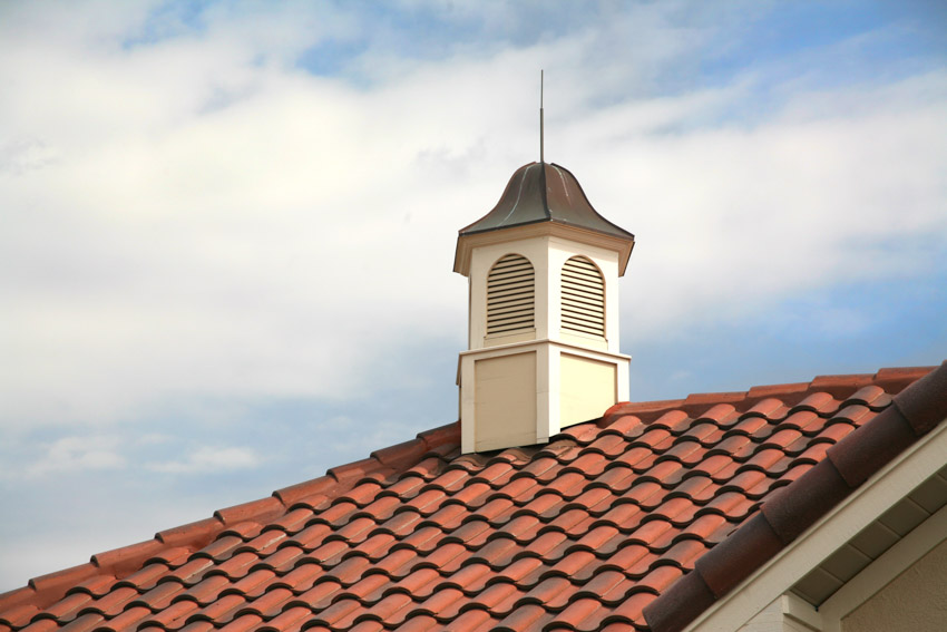 Cupola on top of a red tile roof