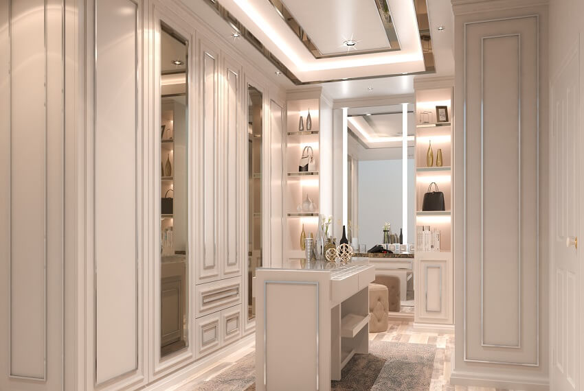 Elegant interior of a walk-in closet with lighting fixtures and paneled floor