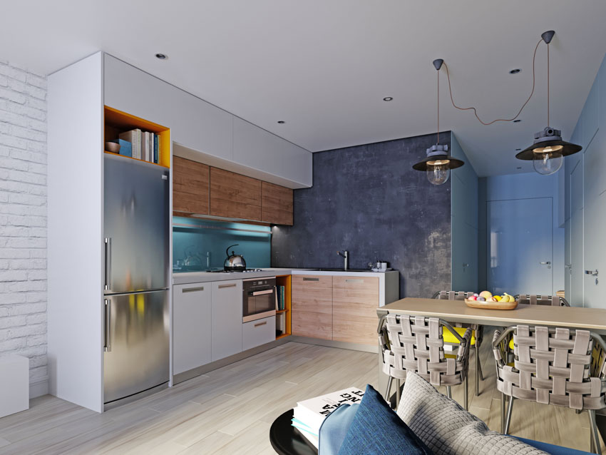 Kitchen with interesting wall accents with cement, slab and painted brick