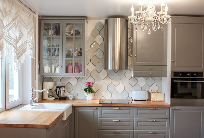 Kitchen with diamond shaped tile up the wall