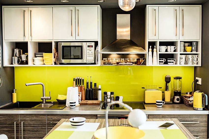 Kitchen with yellow glass accent wall backsplash yellow decor