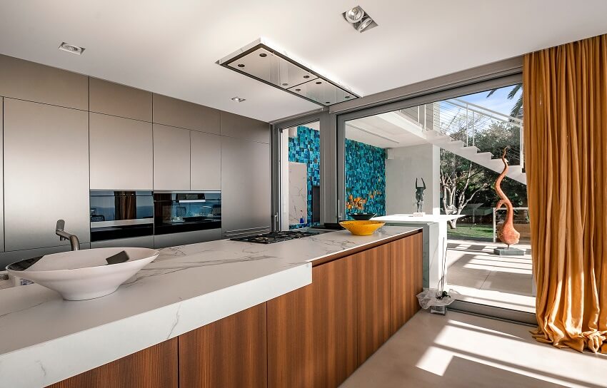 Luxurious kitchen with floor-to-ceiling curtain 