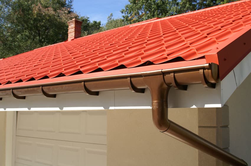 Metal roof with gutter and chimney