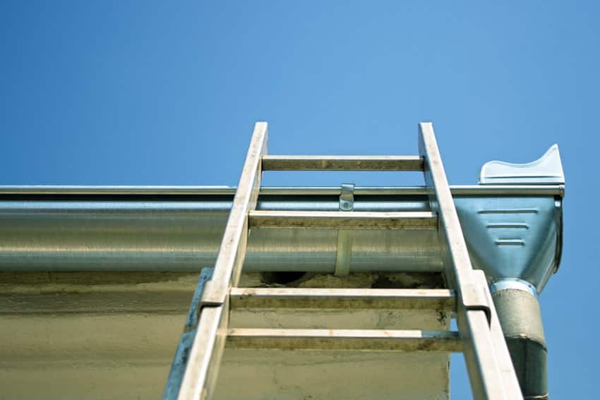 Metal type of ladder on a roof