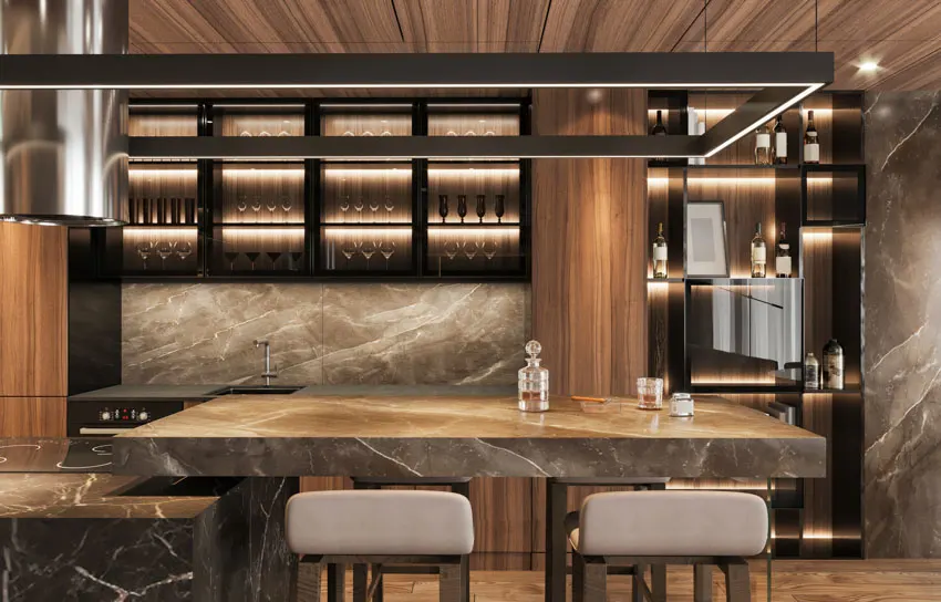 Modern bar with countertop, sintered stone backsplash, wine coolers, range hood, and ceiling lights