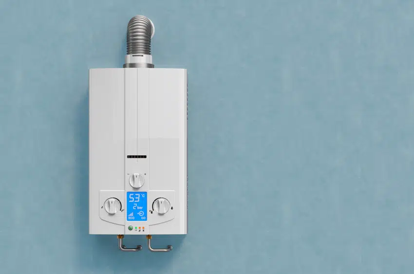 Modern tankless water heater installed on blue wall